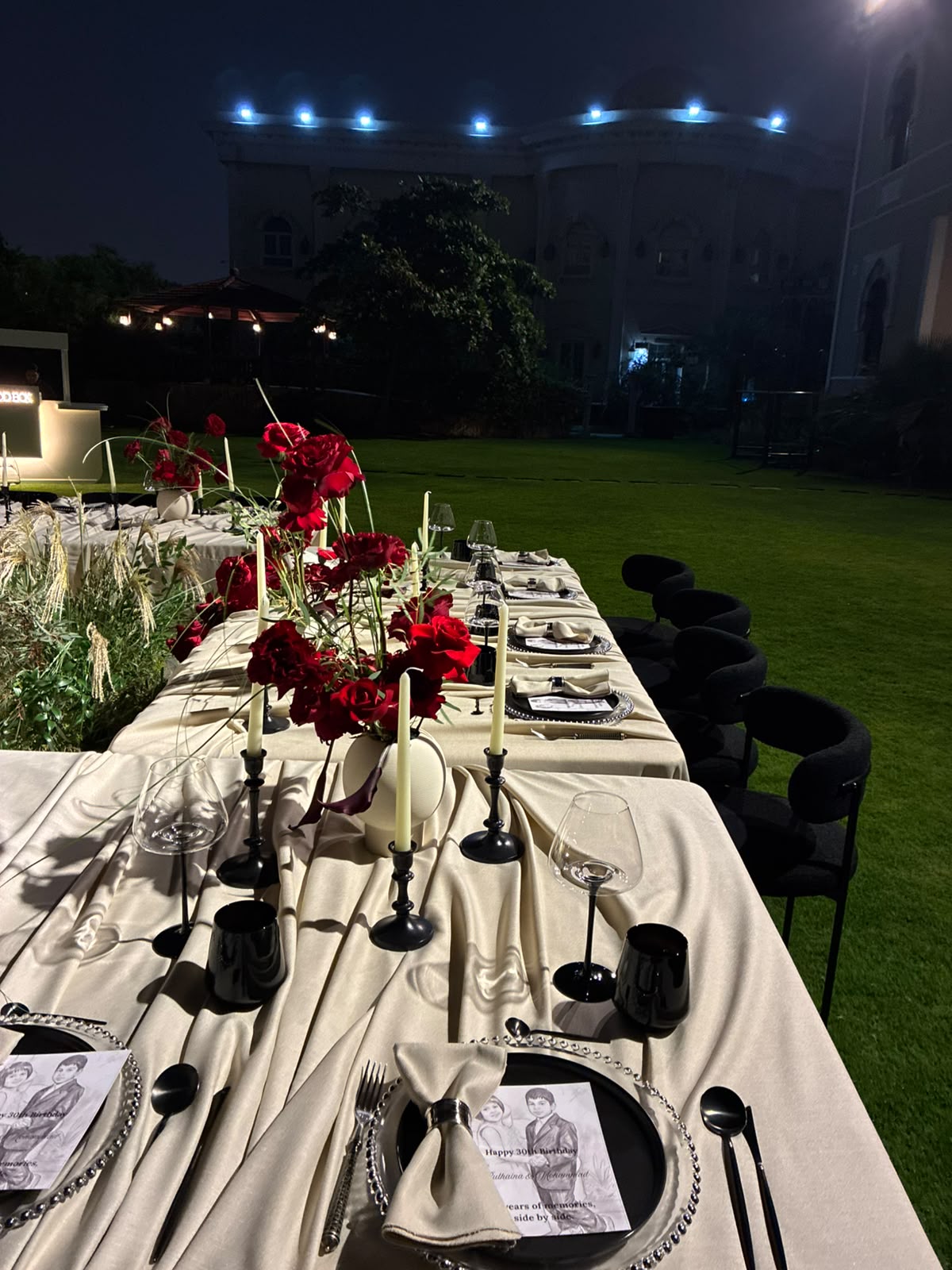Villa catering in Dubai with elegant table styling, candles and floral details