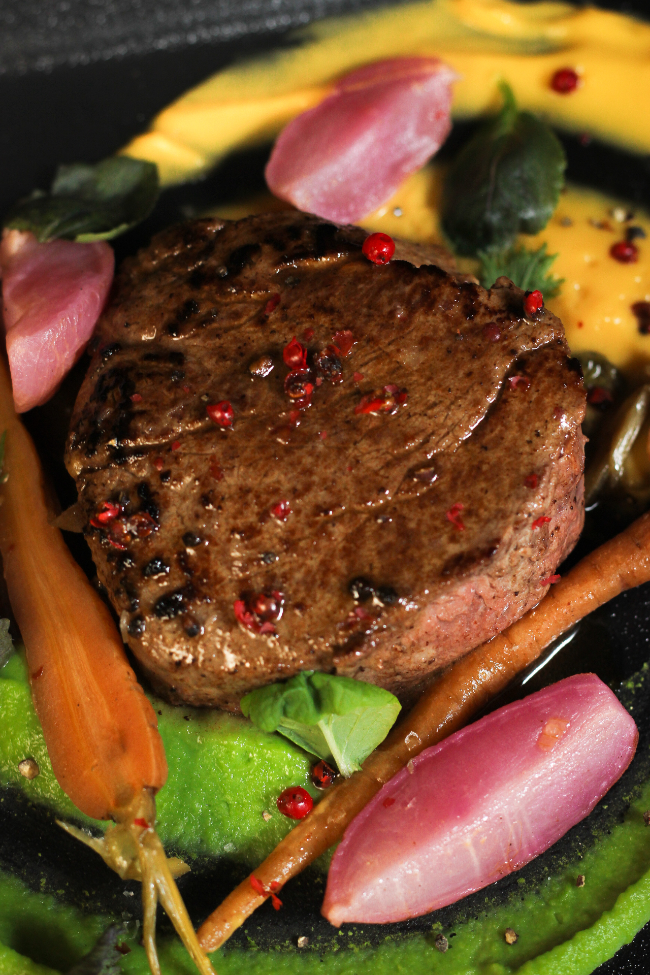 Grilled beef steak with colorful vegetables