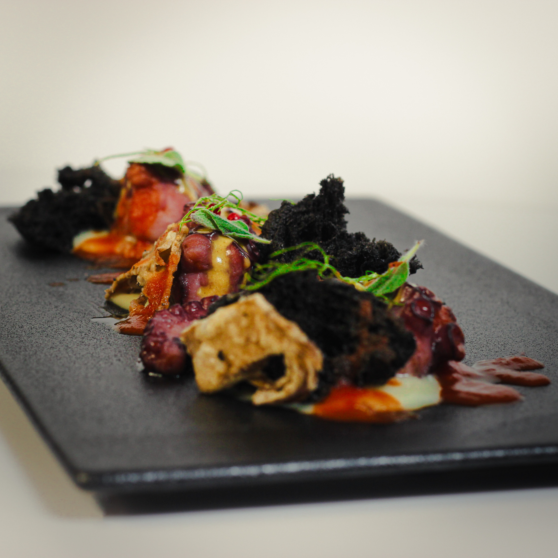 Artistic seafood presentation with octopus